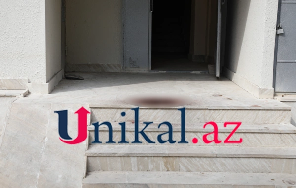 Bakıda oğlunu öldürən qadın özünü binadan atdı