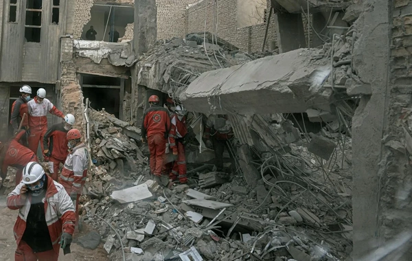 The death toll from the attack on the Iranian city of Qom has risen to 15