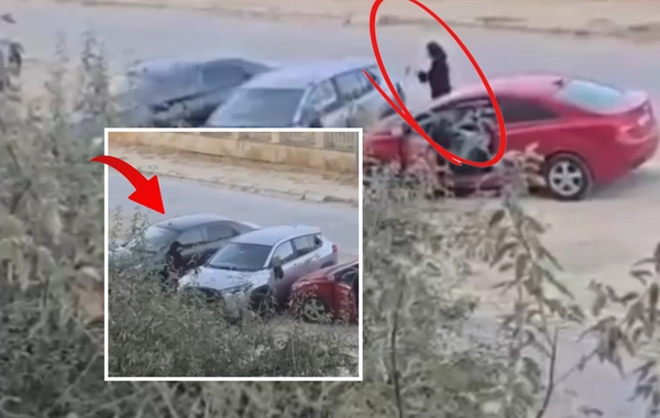 Bakıda qadın avtomobilə hücum edib, parçalamağa çalışdı - ANBAAN VİDEO