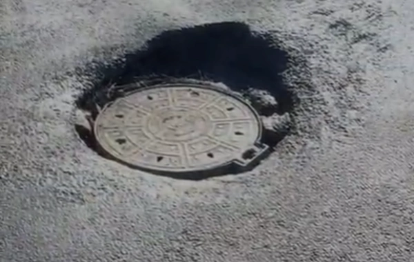 Xırdalanda təhlükəli kanalizasiya lüku - Motosiklet sürücüsü qəza keçirdi