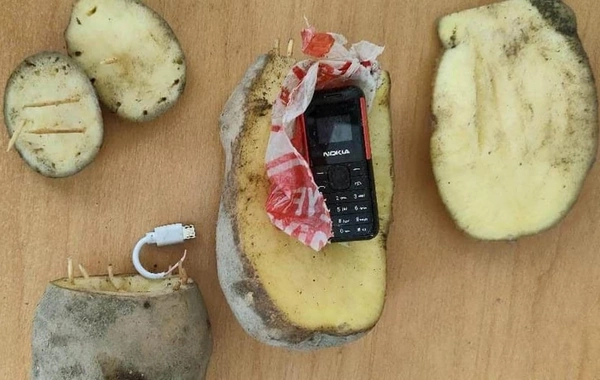 Təcridxanaya kartofun içərisində telefon keçirməyə çalışan şəxs tutulub