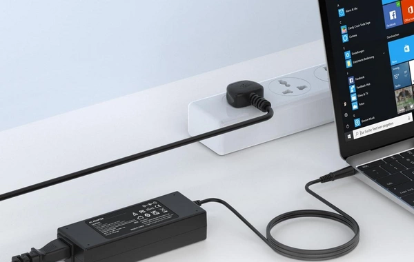 Что это за черная коробка на зарядке для ноутбука