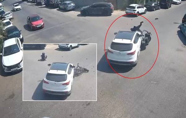 Bakıda motosikletlə maşının toqquşma ANI