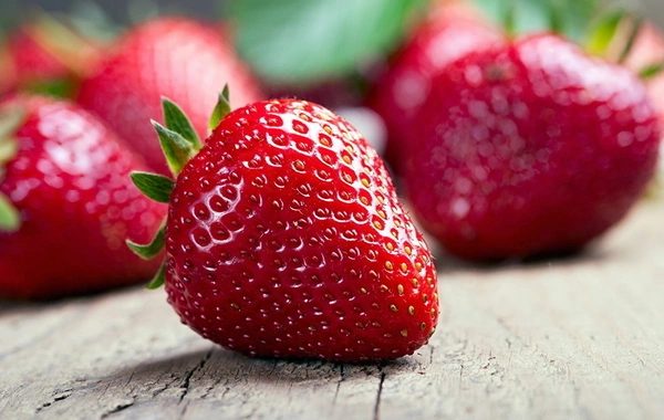 What makes May strawberries dangerous?