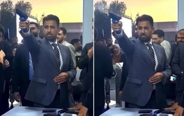 Suriyanın səhiyyə naziri silah götürüb atəş açdı