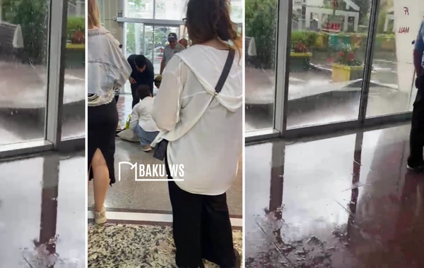 Güclü doluya görə AF Mallın üzlüyü qopub qadının ÜSTÜNƏ DÜŞDÜ