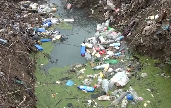 Astara sakinlərinin zibil problemi: Tullantılar kanalların yollarını bağlayır