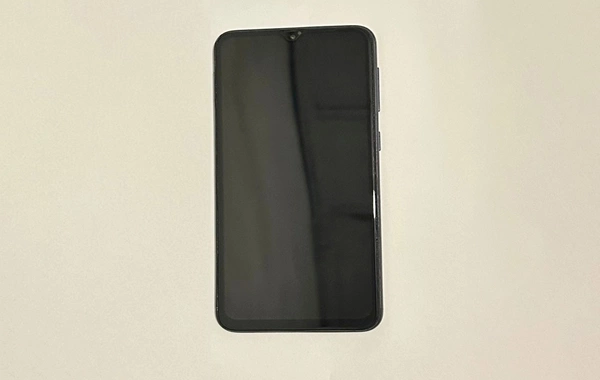 Ana həbsdə olan oğluna telefon keçirməyə cəhd edib