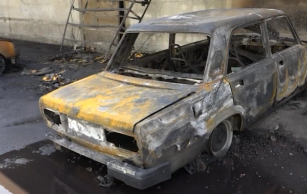 Who will compensate the owners of vehicles damaged in the fire?
