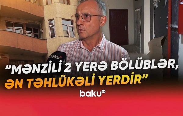 Bakıda 16 mərtəbəli binada TƏHLÜKƏ: Daşıyıcı divarı dağıdıb qapı açdılar