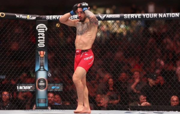 Gürcü əsilli məşhur UFC çempionunu həyat yoldaşı məhkəməyə verdi