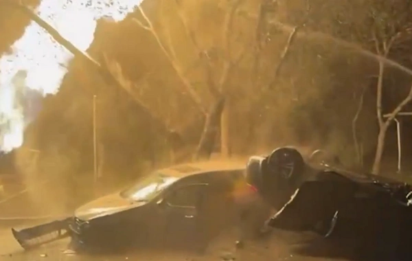 Bakıda Porschenin düşdüyü qəzada baş verən YANĞININ ANBAAN GÖRÜNTÜSÜ