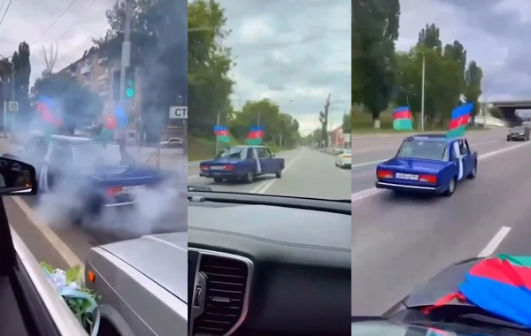 In Russia, police began an investigation after a motorcade with Azerbaijani flags