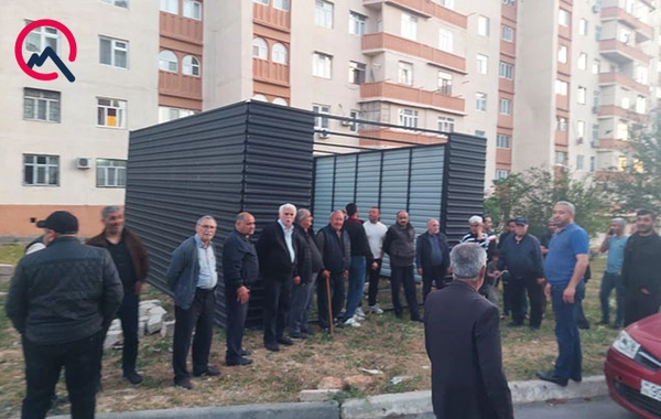 Qazilər sakinlərin həyətində qanunsuz "moyka" tikir?