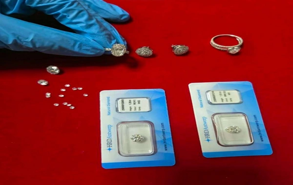 Dubaydan gələn sərnişinin əl yükündə 12,7 karat brilyant və qızıl-zinət əşyaları aşkarlanıb