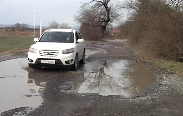 "Ustalarda qalmışıq, pul çatdıra bilmirik, gənclər kəndi tərk edirlər" - Oğuz sakinlərinin yol problemi