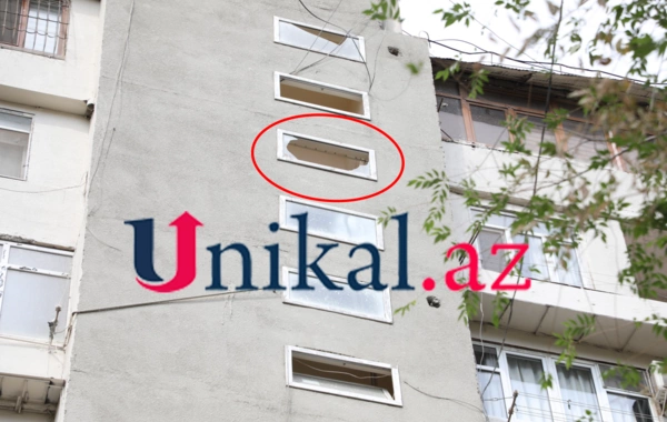 Bakıda oğlunu öldürən qadın özünü binadan atdı