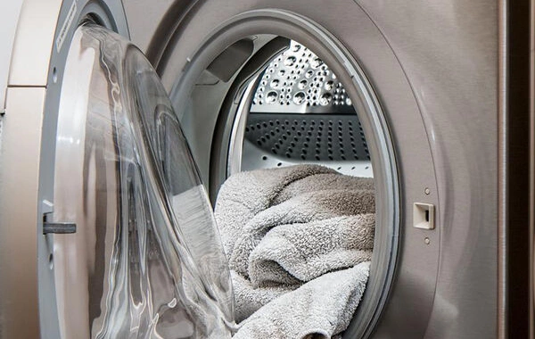 A three-year-old girl climbed into a washing machine and lost consciousness