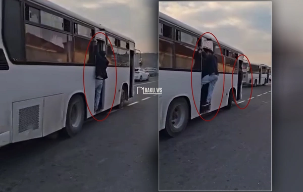 Bakıda ACINACAQLI GÖRÜNTÜ - Açıq qapı, asılı sərnişin