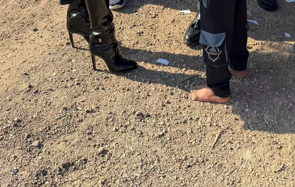 80000-lik çəkməsi ilə yoxsul məhəlləni ziyarət edən vəzifəli qadın tənqid edildi